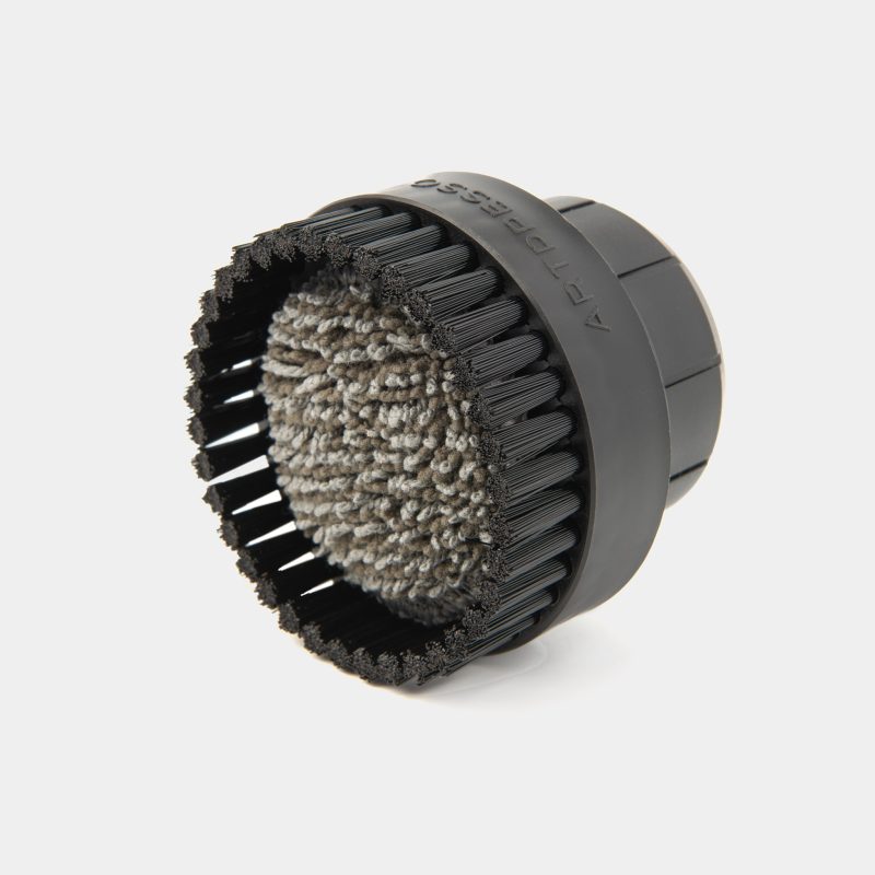 Artpresso Design 58mm Group Head Cleaning Tool upright, showing the bristle ring around the microfiber pad on the brush face