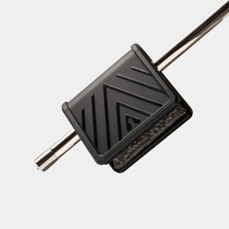 Artpresso steam wand cleaning tool clipped onto the steam wand of an espresso machine