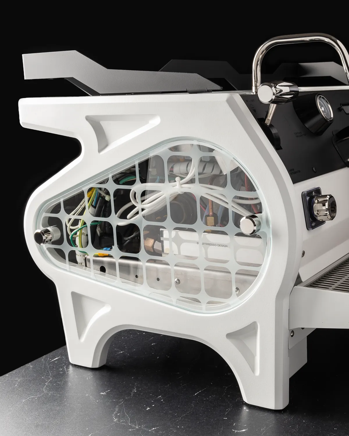 White espresso machine with a skeletal lattice side panel exposing its internal components