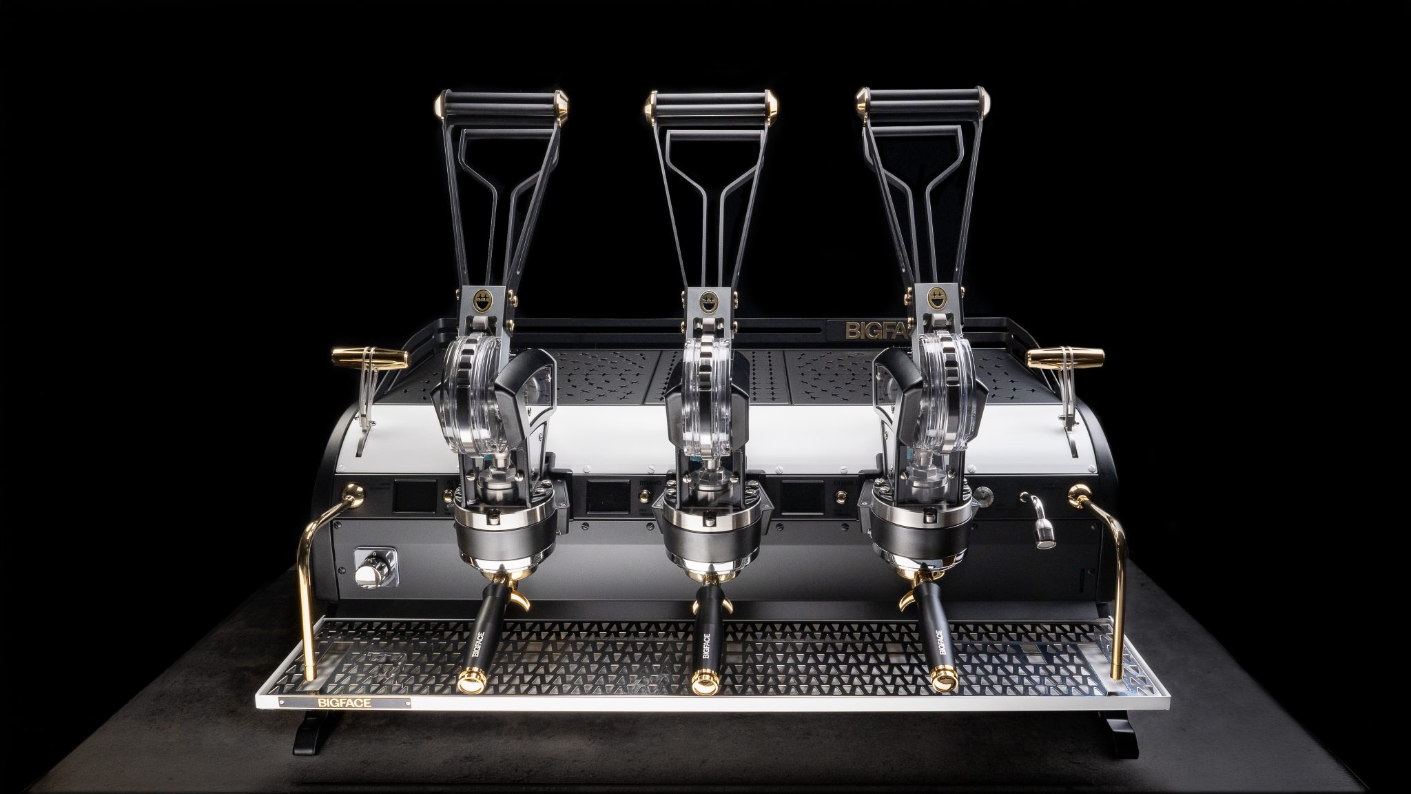 Custom BIGFACE La Marzocco Leva three group lever machine on a dark plinth