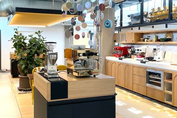 Steven Monti, owner of Artpresso Design with his father at the La Marzocco Academia, in Italy