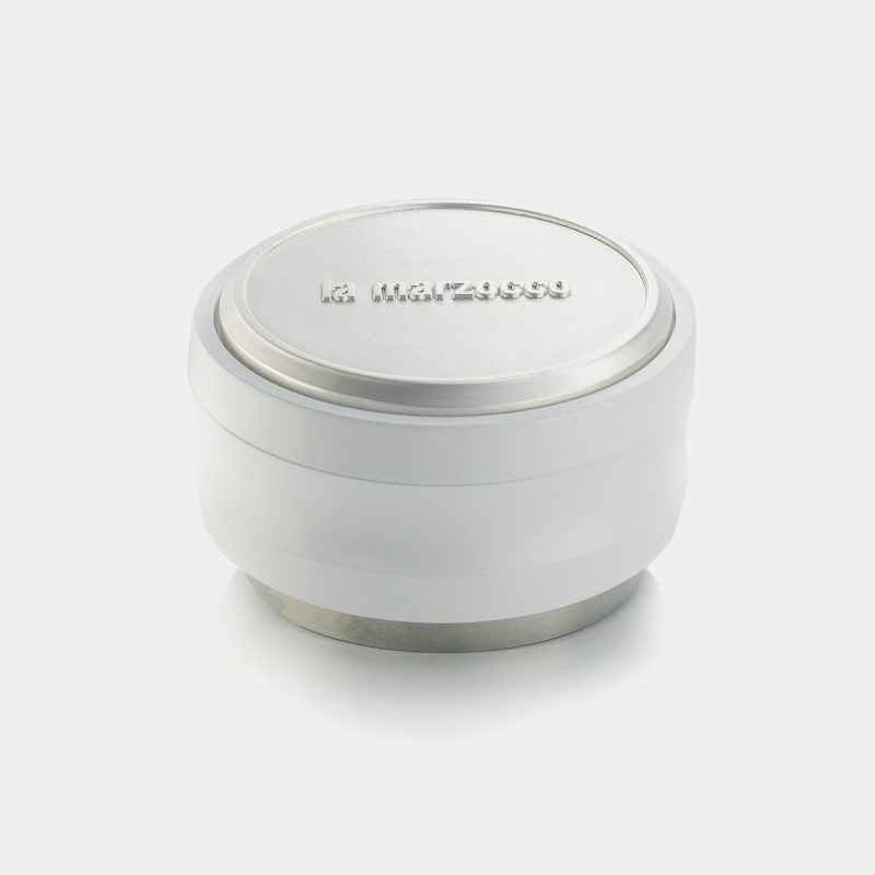White La Marzocco Primo distribution tool with the engraved stainless top plate facing up