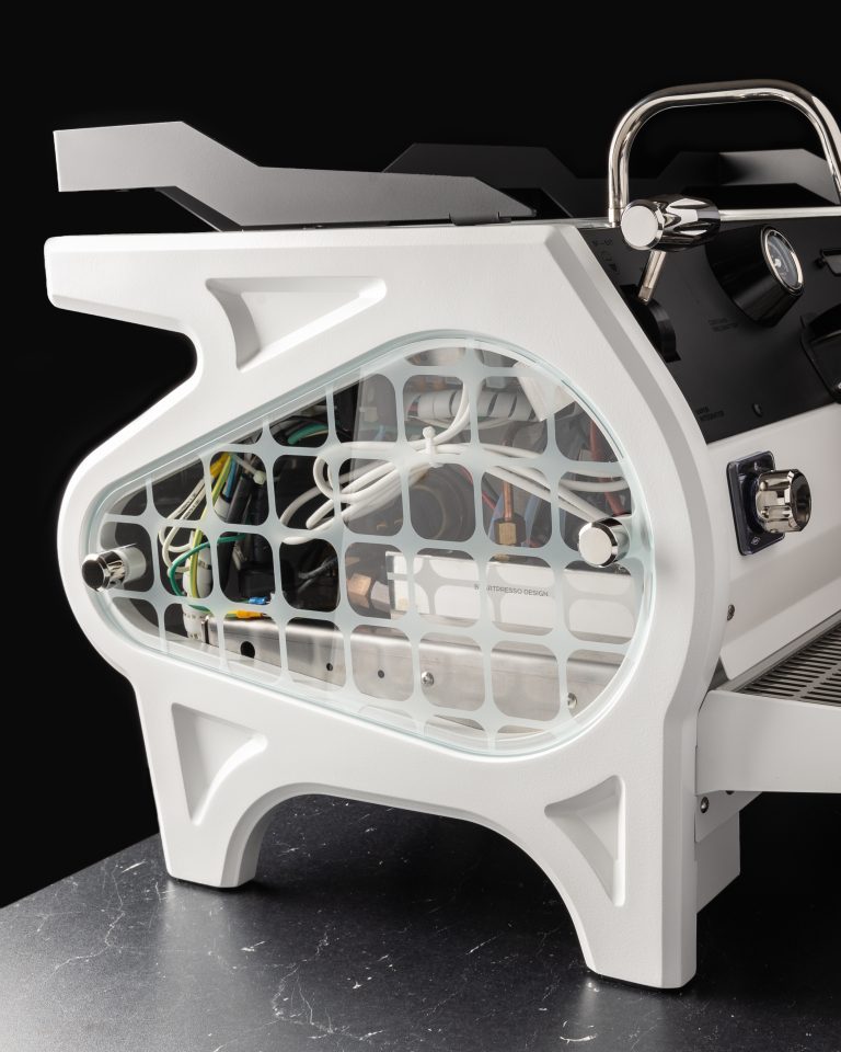 White cast side frame of the BIGFACE Strada with the internal plumbing visible