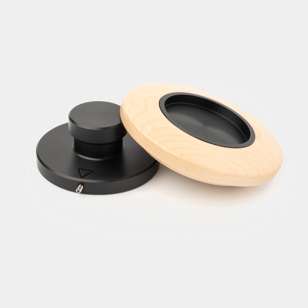 Maple Breville grinder and tamper holder cover beside its black anodised base and post